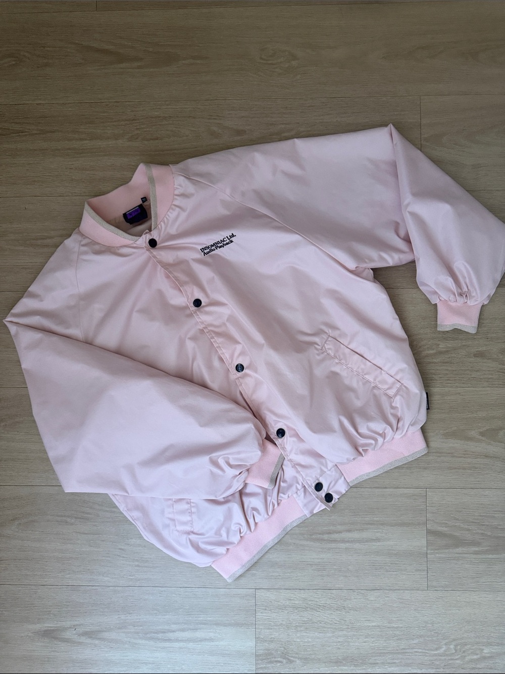 Insomniac LTD Audio Playback Light Pink Bomber Jacket with Embroidered Logo
